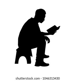 Sitting young man with book silhouette vector