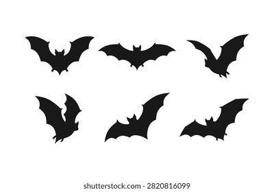 Six bat silhouettes in different flight poses on transparent background