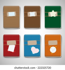 Six different colorful notebooks with labels, vector