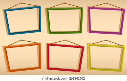 Six wooden frames hanging on the wall