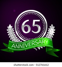 Sixty five years anniversary celebration with silver ring and ribbon.