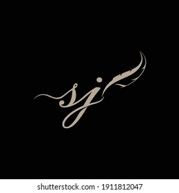 SJ cursive design written in a feather pen.
