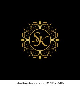 SK Initial logo. Ornament ampersand monogram golden logo black background
