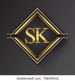SK Letter logo in a square shape gold and silver colored geometric ornaments.