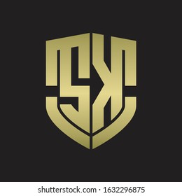 SK Logo monogram with emblem shield shape design isolated gold colors on black background