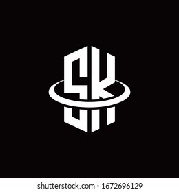 SK monogram logo in a hexagon style and surrounded by a ring