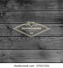 Skateboard badges logos and labels for any use, on wooden background texture