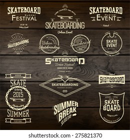 Skateboard badges logos and labels for any use, on wooden background texture