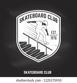 Skateboard club sign on the chalkboard. Vector illustration. Extreme sport. For skate club emblems, signs and t-shirt design. Retro typography design with skateboarder and text.