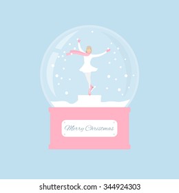 skater girl dances in the Christmas snow globe. New Year souvenir