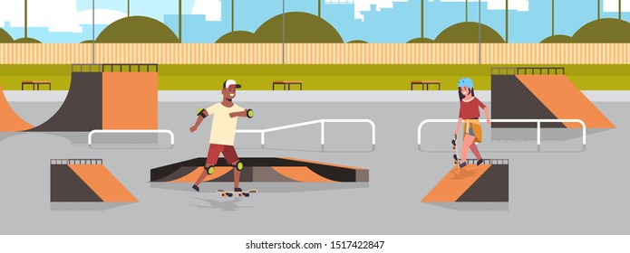 skaters performing tricks in public skate board park with various ramps for skateboarding mix race teenagers couple having fun riding skateboards landscape background flat full length horizontal