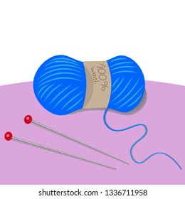 A skein of wool yarn and knitting needles