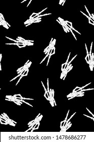 Skeleton hand seamless pattern on black background. halloween bones pattern background. vector illustration