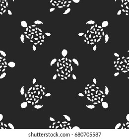 Sketch of abstract turtle. Drawn brush strokes. Seamless pattern. Grunge, ink, paint, graffiti. White tortoises on a black background. Vector illustration.