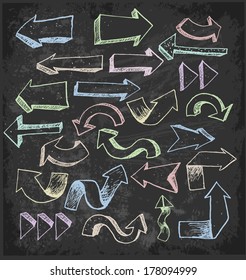 Sketch arrow collection for your design. Hand drawn with color chalks on blackboard