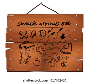 Sketch arrows on wooden plank background. Free hand drawn. Vector illustration.