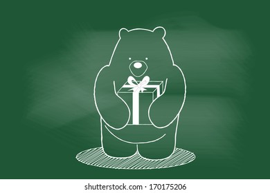 sketch of Bear with gift box on blackboard 