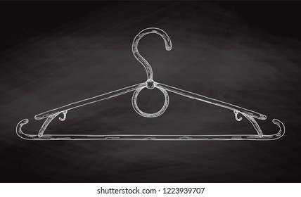 Sketch clothes hangers on chalk board. Vector