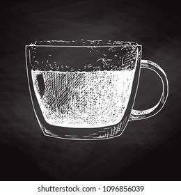 Sketch of a cup of coffee with foam. Vector illustration of a sketch style.