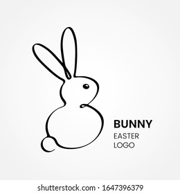 Esbozo de un conejito esponjoso de Pascua en un estilo lineal. logotipo o emblema para los negocios de Semana Santa. ilustración vectorial plana