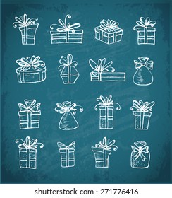 Sketch gift boxes collection on blackboard. Hand-drawn with ink. Vector illustration.