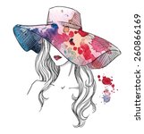 Sketch of a girl in a hat. Fashion illustration. Hand drawn.