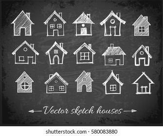 Sketch of houses on blackboard background. Vector illustration.