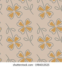 Sketch orange four-leaf clover seamless pattern in simple style. Pale lilac background. Simple print. Vector illustration for seasonal textile prints, fabric, banners, backdrops and wallpapers.