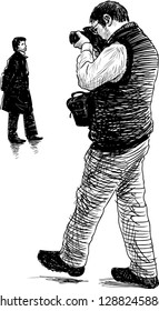 A sketch of a photographer at work