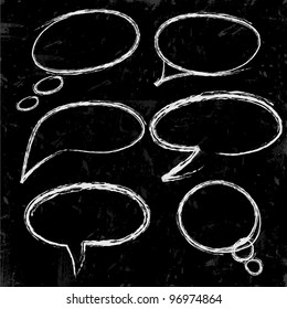 Sketch of speech bubbles chalked on black