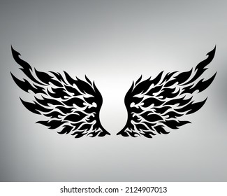 sketch of tribal tattoo wings. vector drawing beautiful and graceful wings made with figures and patterns