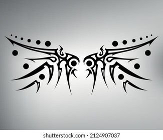 sketch of tribal tattoo wings. vector drawing beautiful and graceful wings made with figures and patterns