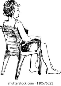 sketch youth sits in an arm-chair barefoot