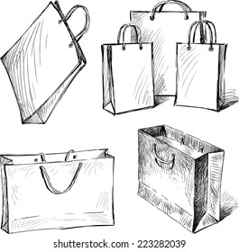 Sketches of shopping bags set, vector hand drawn illustration isolated on white