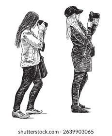 Sketches of two casual girls photographing on camera outdoors, side view, realistic hand drawing, vector illustration