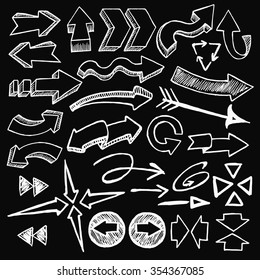 Sketchy arrows on black background. Freehand drawn. Vector illustration.