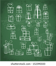 Sketchy gift boxes on chalckboard.. Vector illustration. 