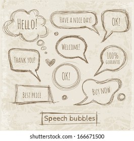 Sketchy speech and thought bubbles hand-drawn with ink. Vector illustration. 