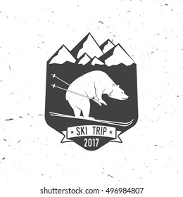 Ski club concept with bear. Vector ski club retro badge. Concept for shirt, print, seal or stamp. Ski club - wild bear. Typography design- stock vector. Family vacation, activity or travel. 