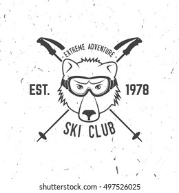 Ski club concept. Vector ski club retro badge. Concept for shirt, print, seal or stamp. Skis, mountain, bear and goggles. Typography design- stock vector. Family vacation, activity or travel.