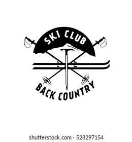 Ski club vector logo. Back country skiing vector badge. Mountaineering vector logo design template. Axe illustration. Ski and poles illustration. Retro hipster emblem of outdoor adventures.
