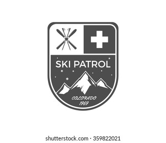 Ski Patrol Label. Vintage Mountain winter sports explorer badge. Outdoor adventure logo design. Travel hand drawn and hipster color emblem. First aid icon symbol. Monochrome design. Wilderness Vector.