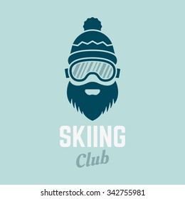 Skier head with beard in ski glasses and winter hat isolated vector logo template for skiing club