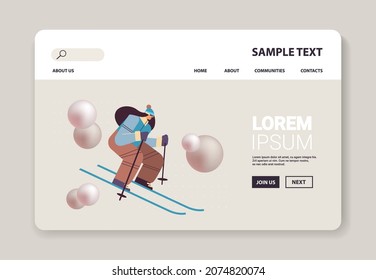 skier woman sportswoman skiing doing activities winter vacation concept full length horizontal