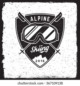 skiing emblem. logotype template. outdoor activity symbol with ink stamp texture