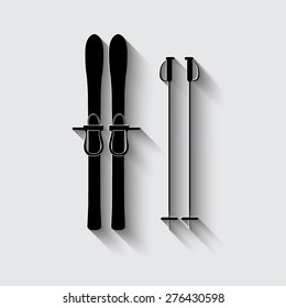 Skiing gear set - assortment of skiing equipment silhouette  on a grey background