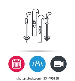 Skiing icon. Ski and sticks sign. Group of people, video cam and calendar icons. Vector