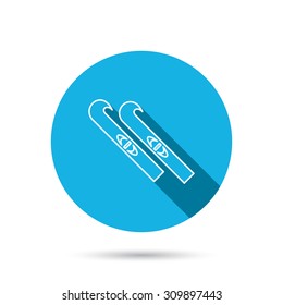 Skiing icon. Skis sign. Winter sport symbol. Blue flat circle button with shadow. Vector
