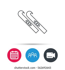 Skiing icon. Skis sign. Winter sport symbol. Group of people, video cam and calendar icons. Vector