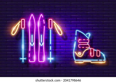 Skiing set neon icon. Skis, ski poles and boots glowing sign. Vector illustration for design. Sports concept.